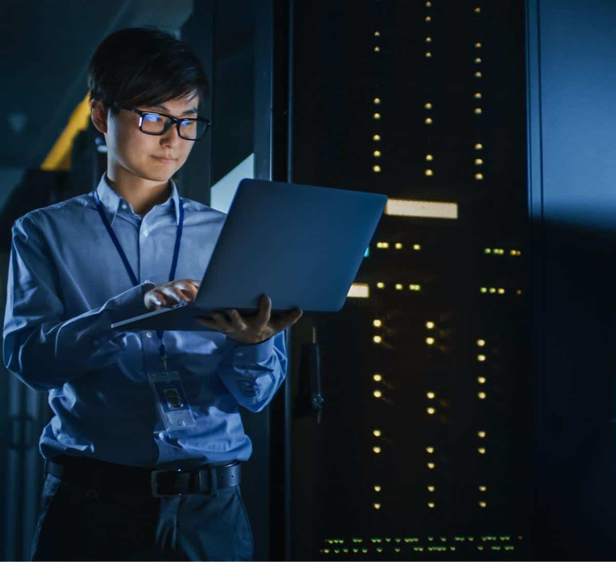 man working on server side security measures for a cybersecurity company