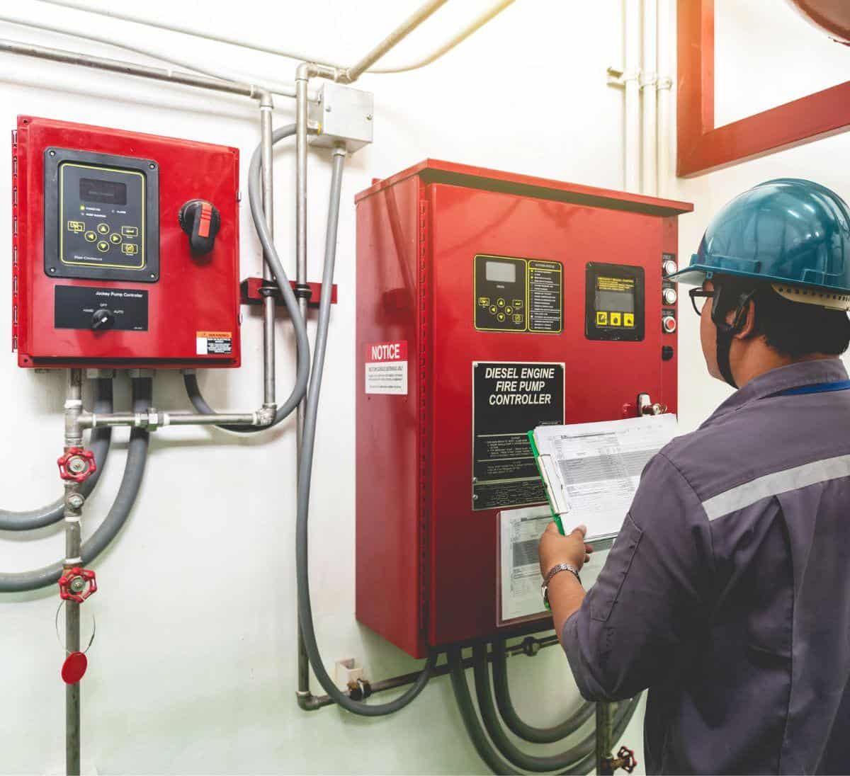 systems integrator working on a diesel pump controller